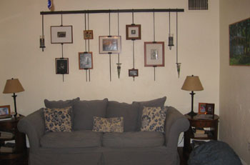 The family photos are displayed in the living room.