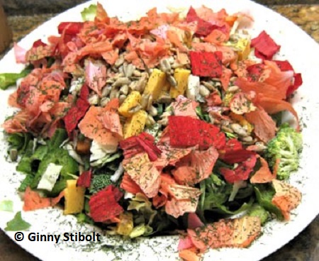 Hibiscus petals used as garnish on this salad. Photo by Stibolt