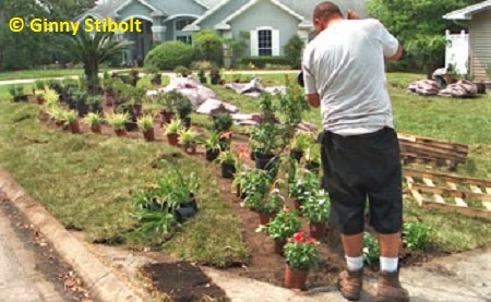Landscapers get to work.  Photo by Stibolt