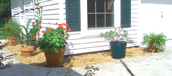 The containers allow the flexibility to change this bed for each season.  
  Photo by Stibolt