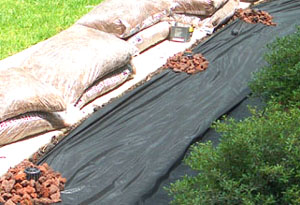 Front bed - the laying of the weed barrier.  Photo by Stibolt