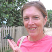 Ginny Stibolt with tropical butterfly in Honduras