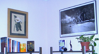 Calla Lily Botanical print and Margorie Stonam Douglas poster in the corner above the bookcases.