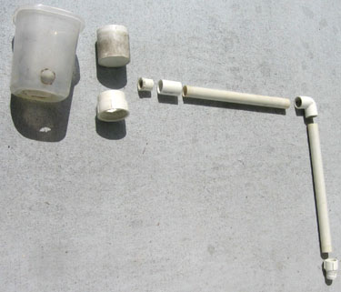 All the parts for a rain barrel diverter.  Photo by Stibolt