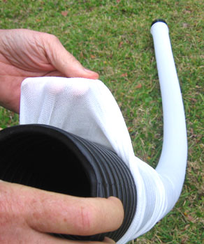 10-foot sections of perforated pipe were covered with drainage sleeves.  Photo by Stibolt