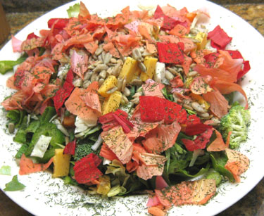 Hibiscus petals used as garnish on this salad. Photo by Stibolt
