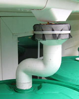 Rainwater catcher pipes for the new gutter system.  Photo by Stibolt